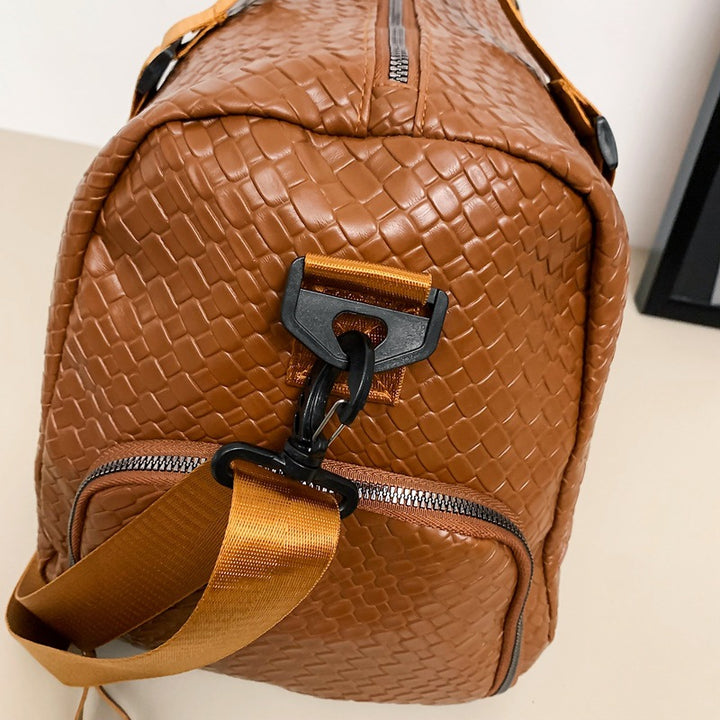 Elegante Woven Leather Duffle Bag