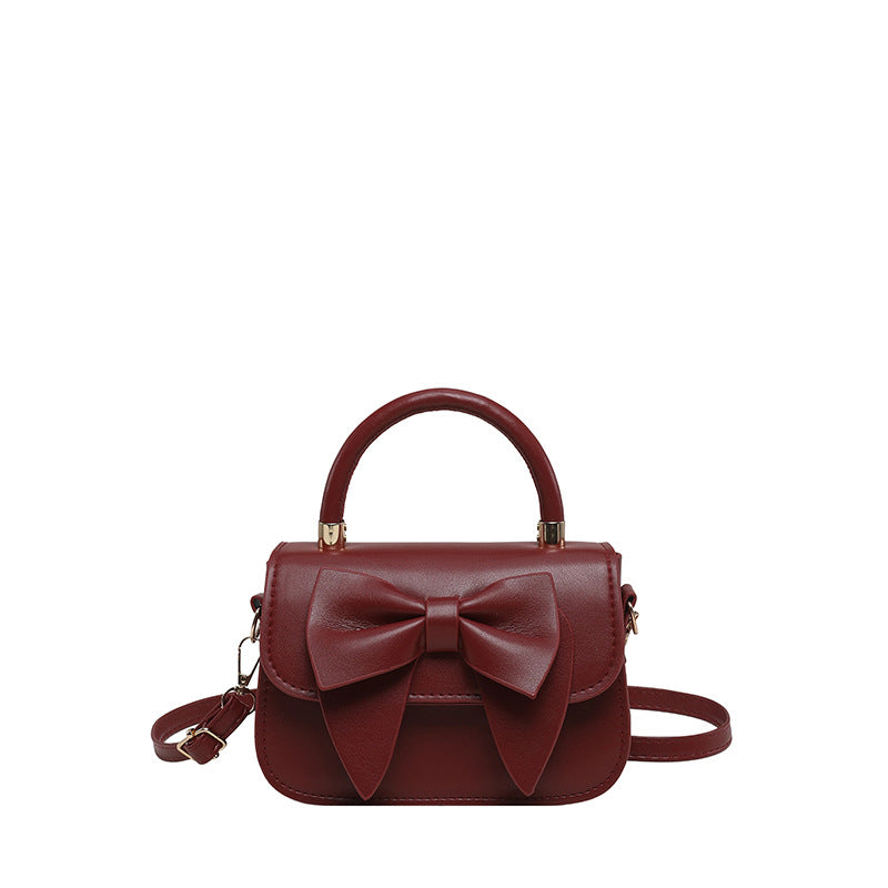 Schultertasche mit Schleifenakzent