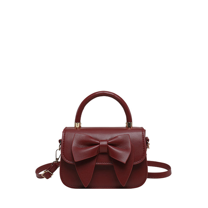 Schultertasche mit Schleifenakzent