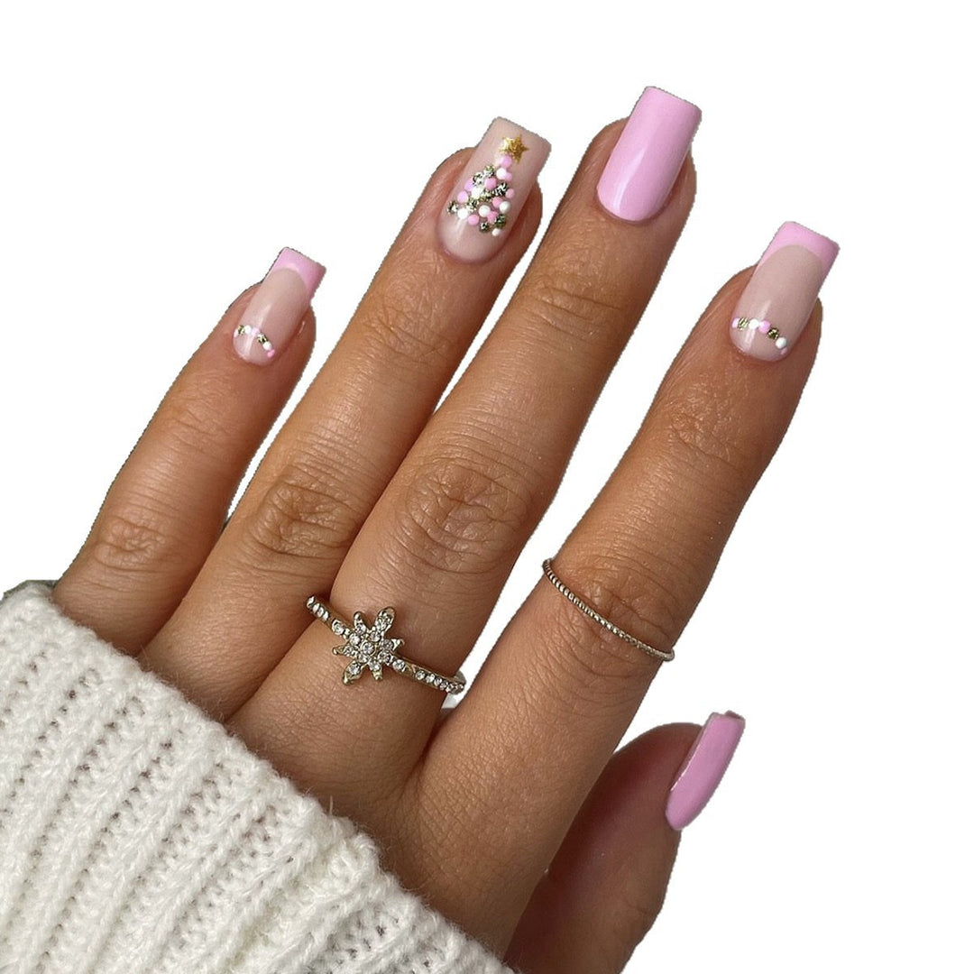 Kunstnagelset mit festlichem Weihnachtsbaum-Design und Glitzerverzierungen Karnz