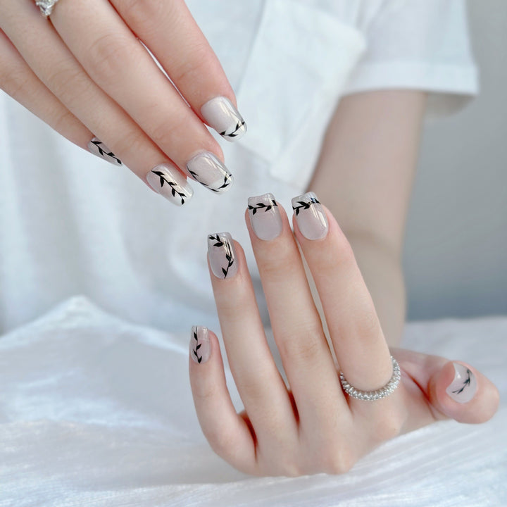 Künstlerisches Press-On Nagelset mit botanischen Designs