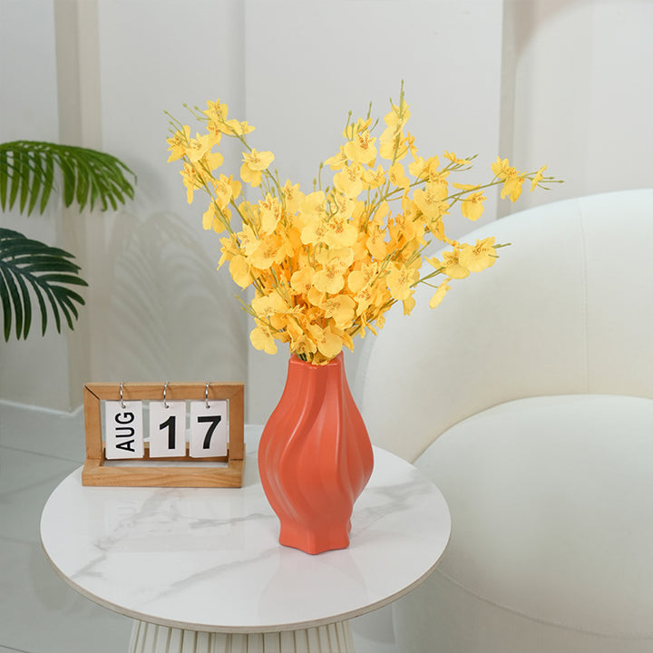 Elegante geschwungene dekorative Blumenvasen Karnz