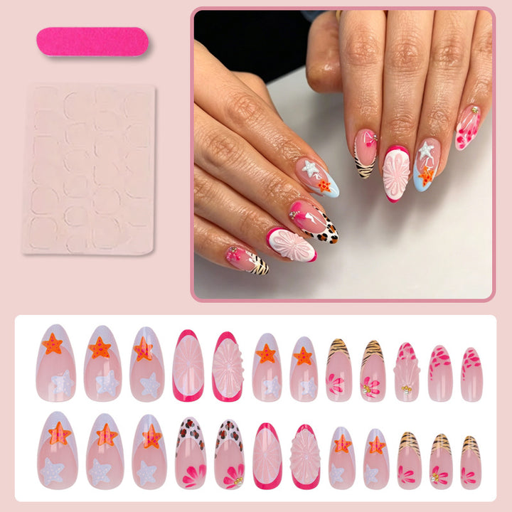 Kunstnagelset mit kreativen floralen und maritimen Designs Karnz