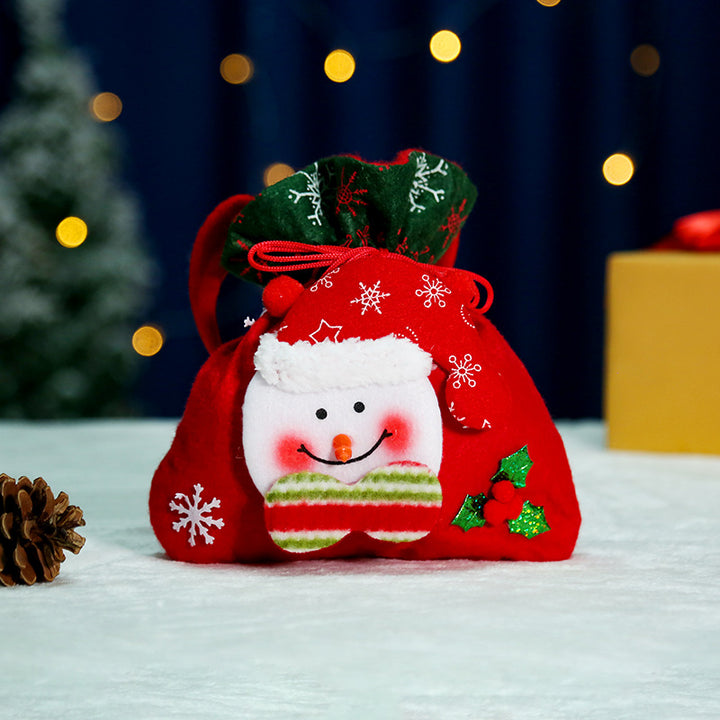Niedlicher Weihnachtsgnom mit Geschenkesack Karnz