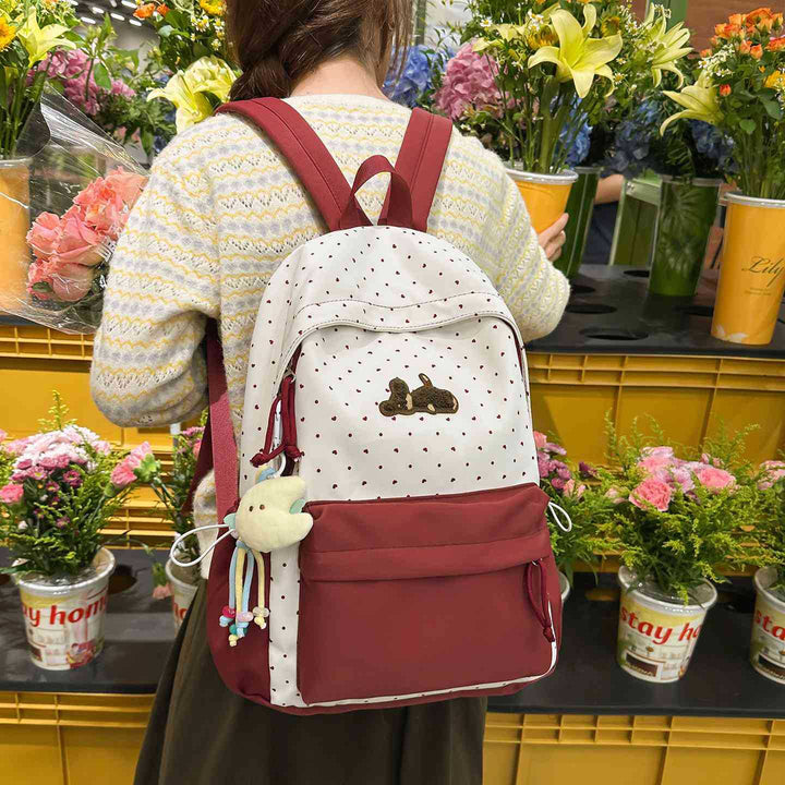 Verspielter gepunkteter animierter Rucksack Karnz