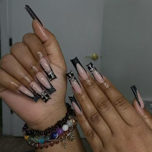 Dekorative Stiletto Press-On Nägel mit Sternakzenten Karnz