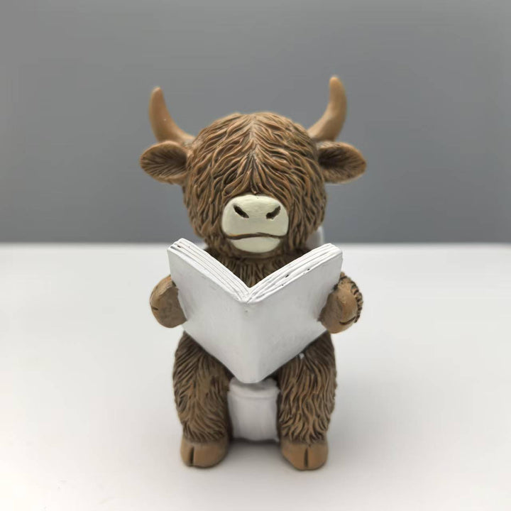 Lustige Dekofigur eines Highlandrinds in Badewanne Karnz