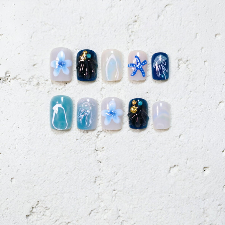 Ozean-inspiirertes künstlerisches Press-On-Nageldesign Karnz