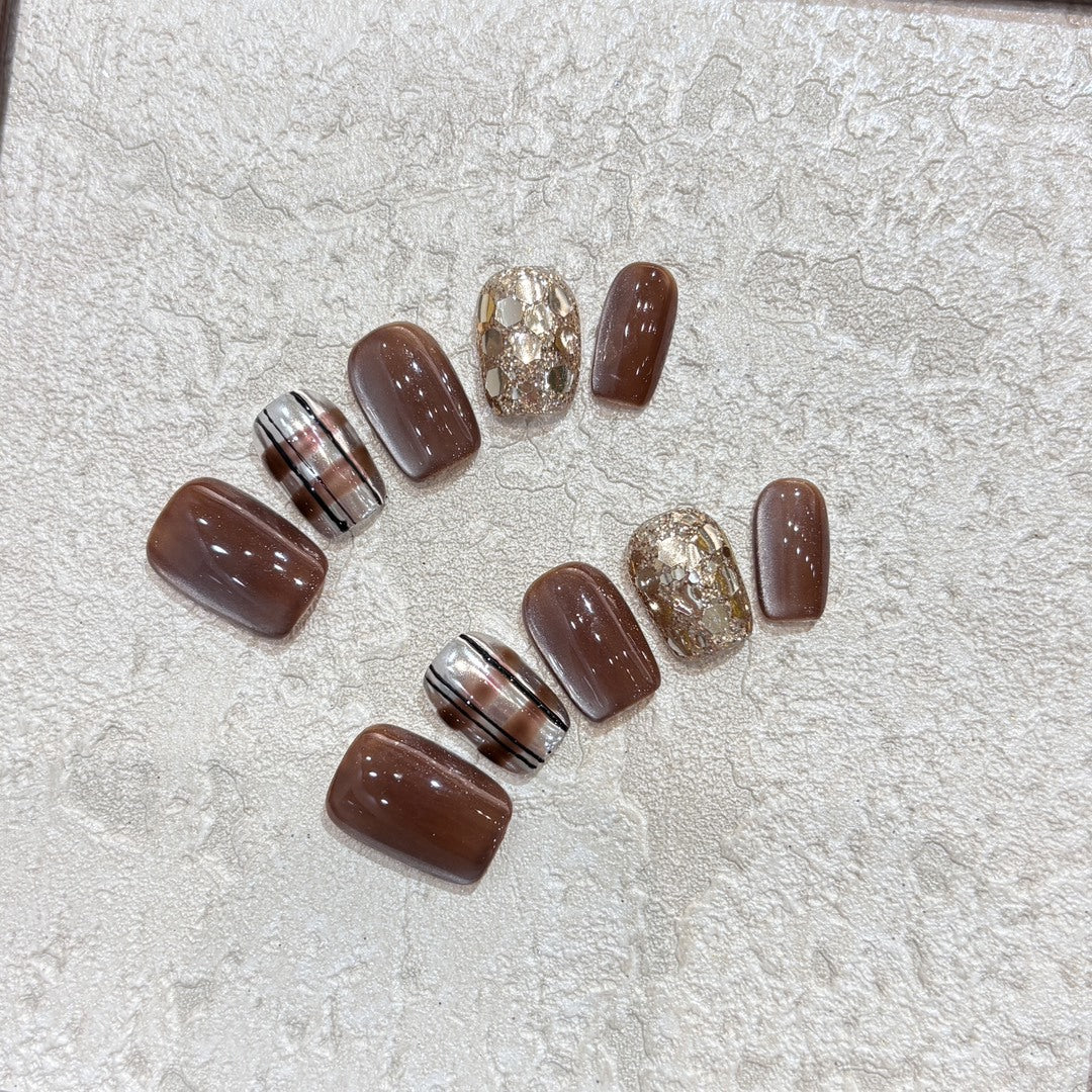 Kunstnägel-Set mit Glitzer- und Goldakzenten Karnz