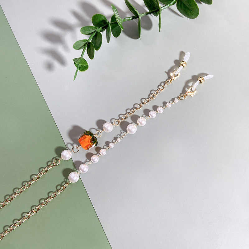 Elegante Kette mit Perlen und Rubinen Karnz