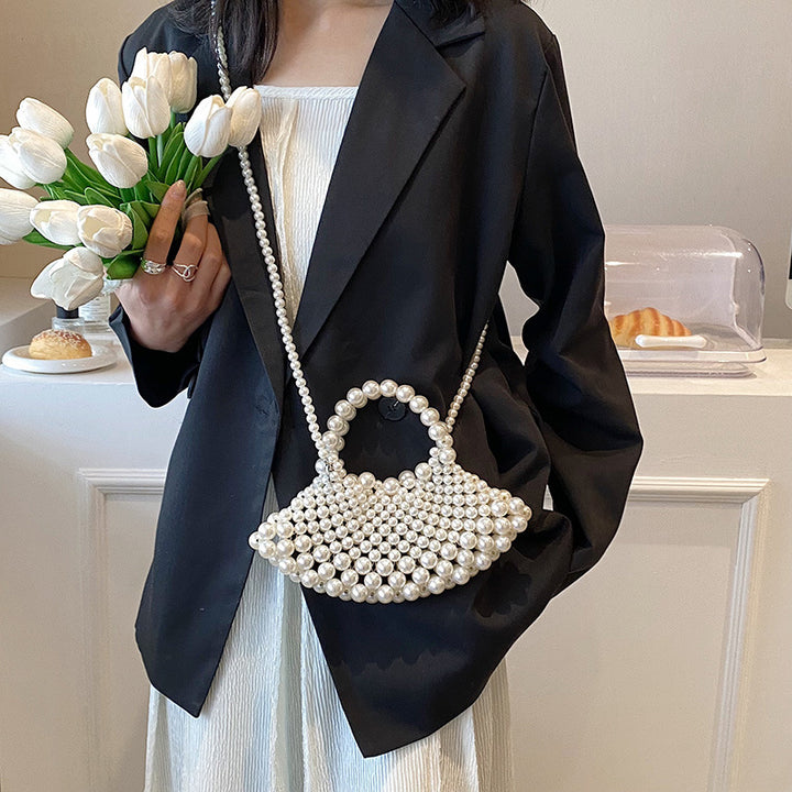 Elegante Handtasche mit Perlendetails