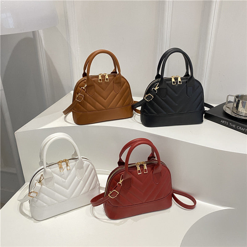 Gepatchte Mini-Handtasche Karnz