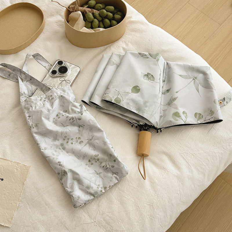 Damen Faltbarer Regenschirm mit elegantem botanischem Muster Karnz