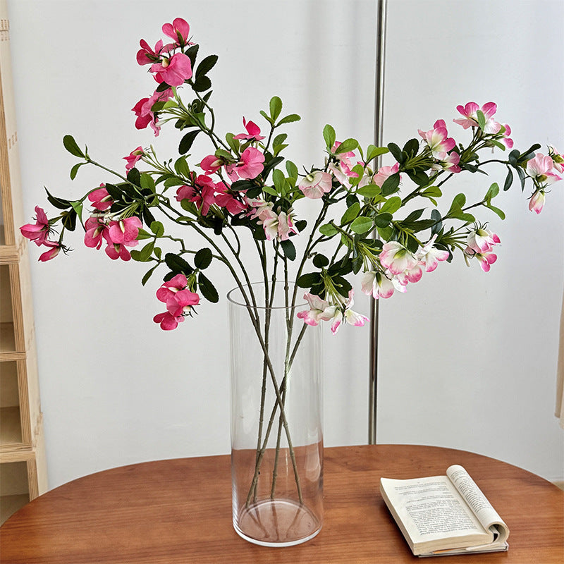 Künstlicher Blütenzweig mit lebhaften rosa Blüten Karnz