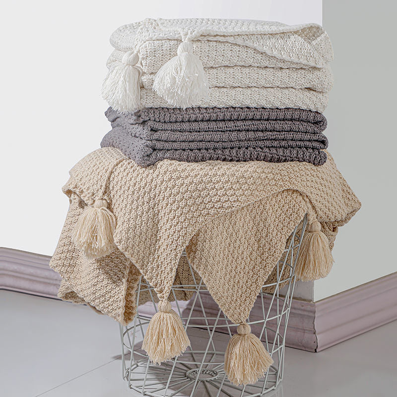 Strukturierte Strickwurfdecke