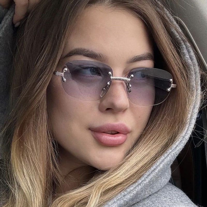 Damen elegante quadratische Sonnenbrille mit transparenten Gläsern und hochwertigem Metallrahmen Karnz