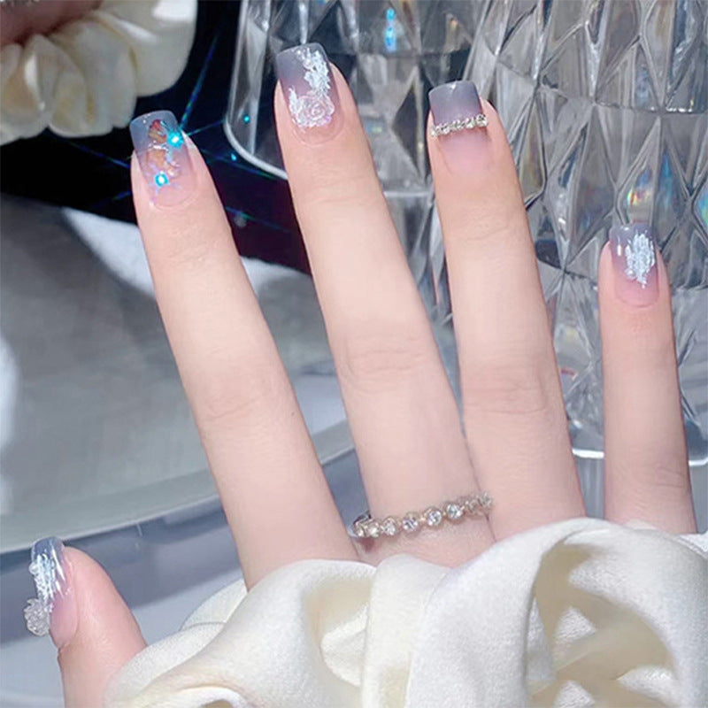 Glamouröse Kunstfingernägel mit Glitzer- und Mondmotiven Karnz