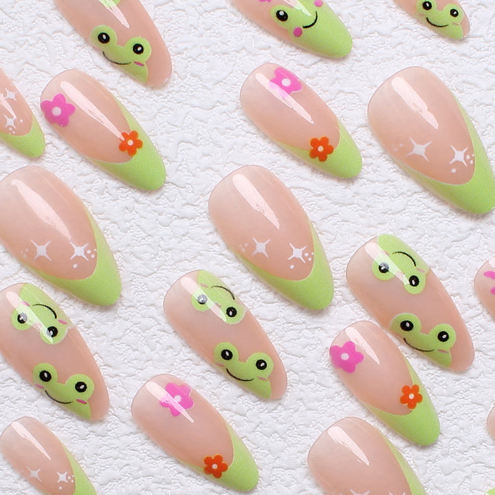 Kunstnagelset mit kreativen Froschmotiven und verspielten Akzenten Karnz
