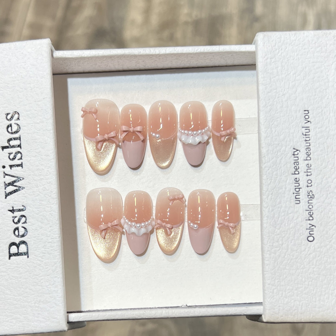 Elegantes Press-On Nagel Kunst Set mit Perlen- und Schleifenakzenten Karnz