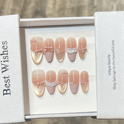 Elegantes Press-On Nagel Kunst Set mit Perlen- und Schleifenakzenten Karnz
