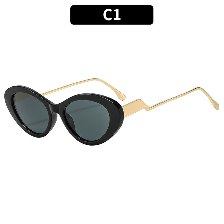 Elegante Retro Katzenaugen-Sonnenbrillen mit stylischen goldenen Akzenten