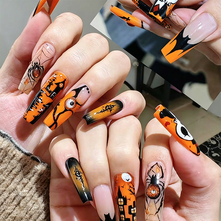 Kunstnagelset mit Halloween-Motiven und kreativem Glitzer Karnz