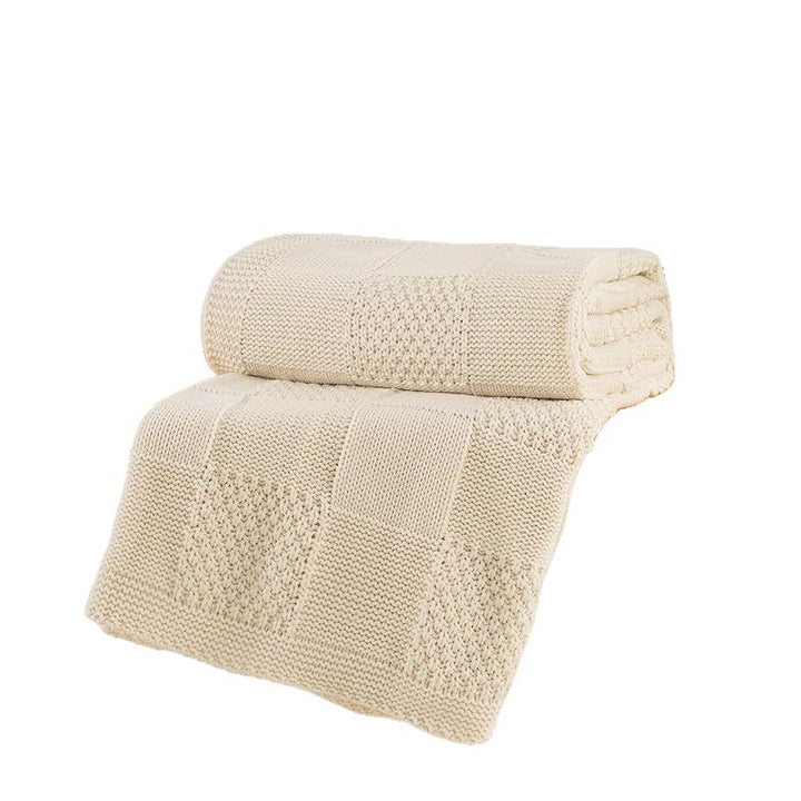 Strukturierte Strickwurfdecke