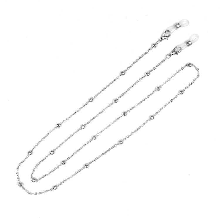 Stilsicheres Brillenband Aus Edelstahl mit Perlenförmigen Designelementen Karnz