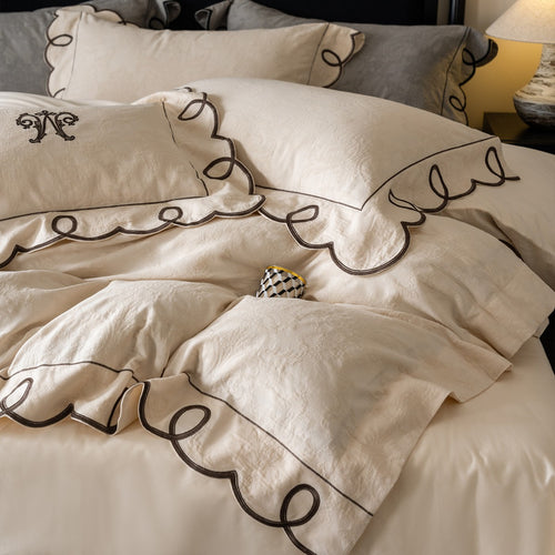 Besticktes Wellen-Loop Jacquard Bettbezug-Set mit passenden Kissenbezügen