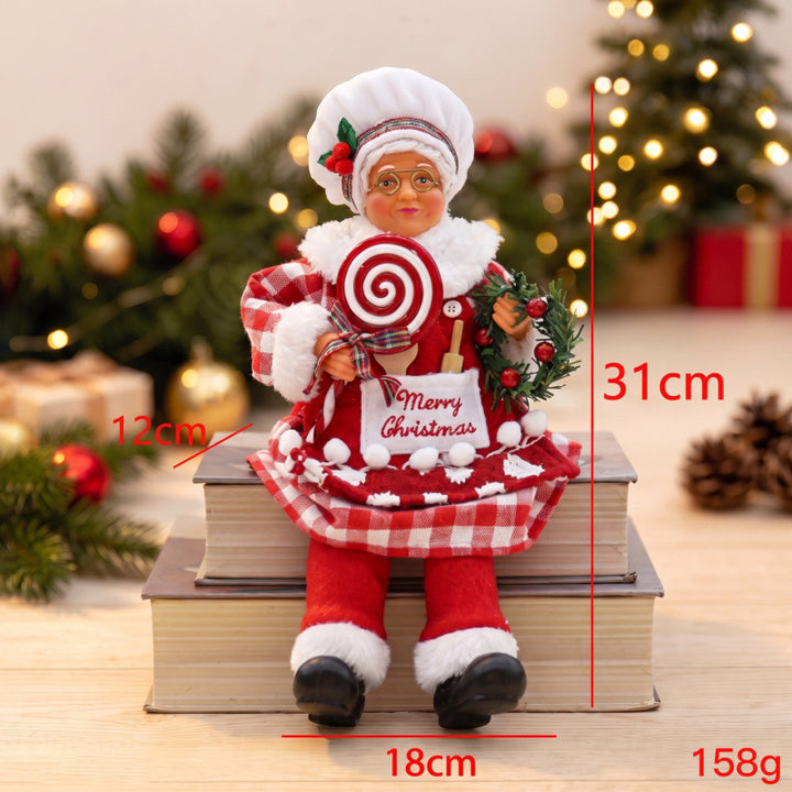 Nostalgische Weihnachtsmann Figur mit Lebkuchen-Keks Karnz