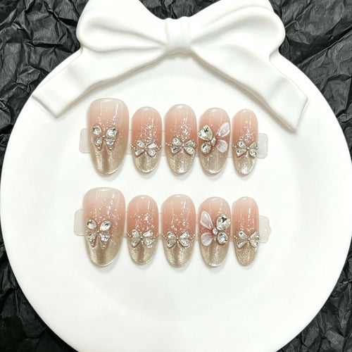 Dekoratives Press-On Nagelkunst-Set mit Rhinestone-Bow-Akzenten