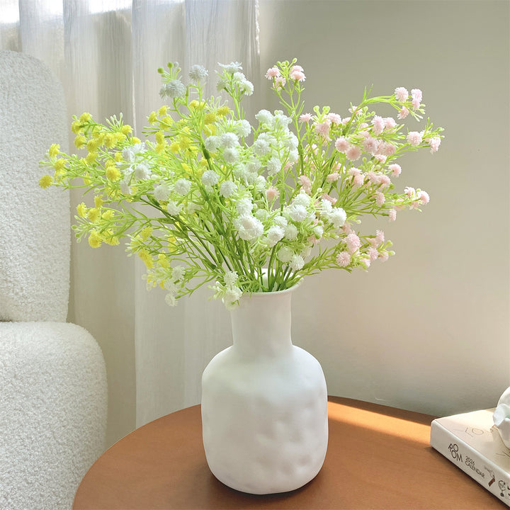Dekorativer Kunstblumenstrauß