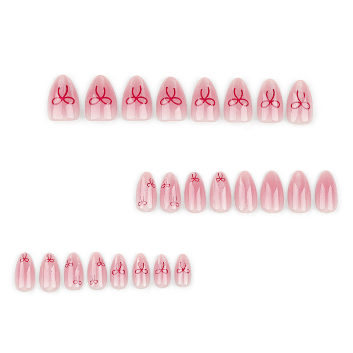 Künstliche Nagelkunst mit Schleifenmotiv Karnz