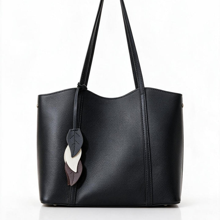 Gepunktetes vegan-leder strukturiertes Tote mit Blattcharm & langen Schulterträgern