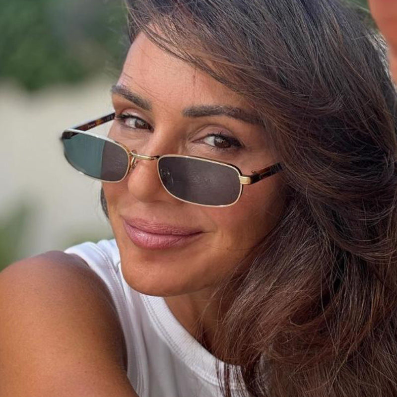 Damen modische Sonnenbrille mit stilvollem Metallrahmen und orangefarbenen Gläsern Karnz