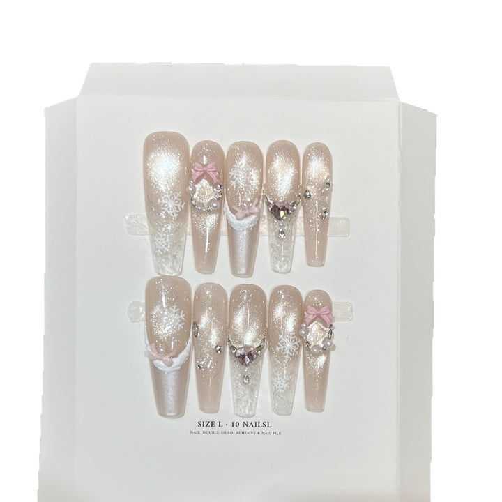 Dekorativer Stiletto Press-On Nagelset mit Strass- und Glitzerakzenten Karnz