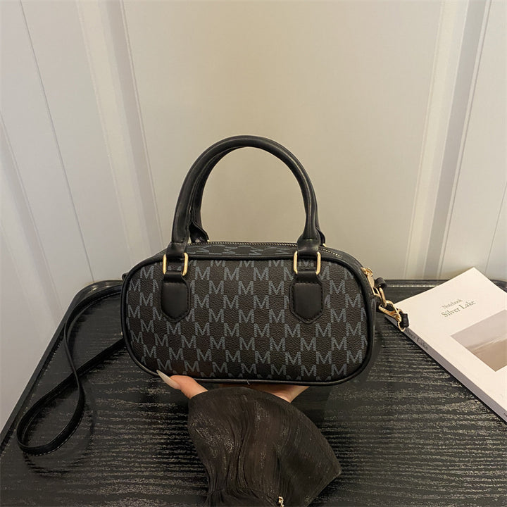 Stylische Monogram-Handtasche
