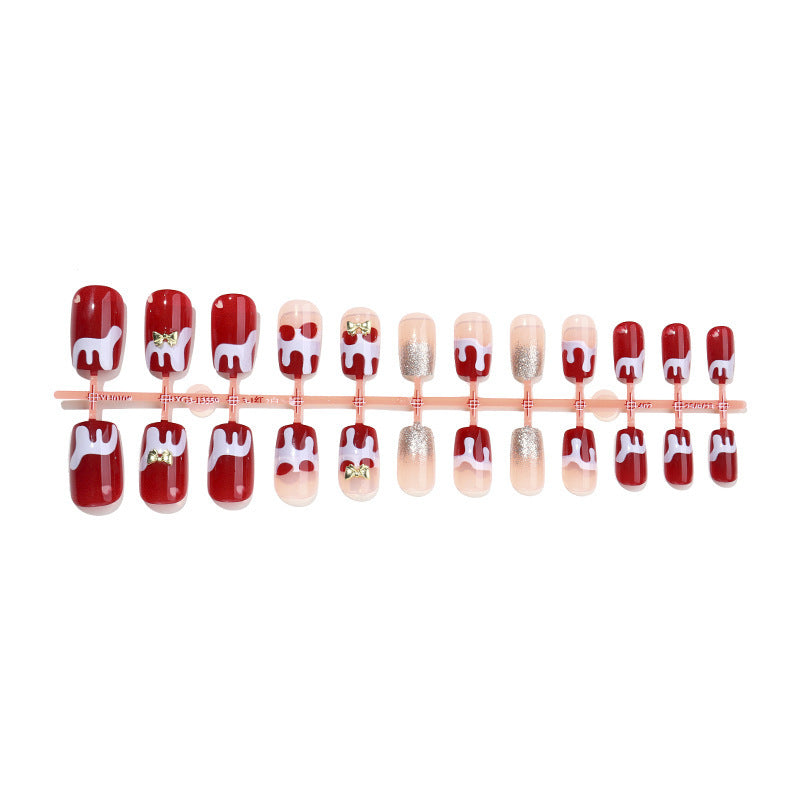 Kunstnagelset mit festlichen Weihnachtsmotiven Karnz