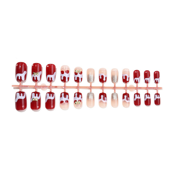 Kunstnagelset mit festlichen Weihnachtsmotiven Karnz