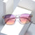 Damen elegante Sonnenbrille mit transparentem Rahmen und stylischen Akzenten Karnz
