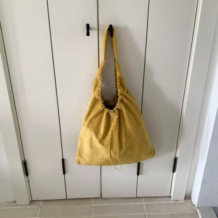 Legere Kordelzug Schultertasche