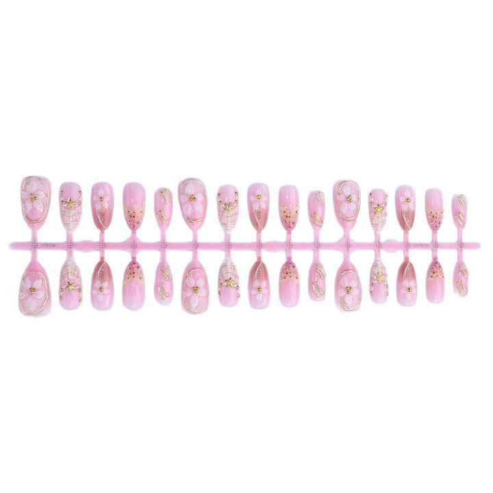 Elegantes, mit Blumen verziertes Press-On-Nagelset Karnz