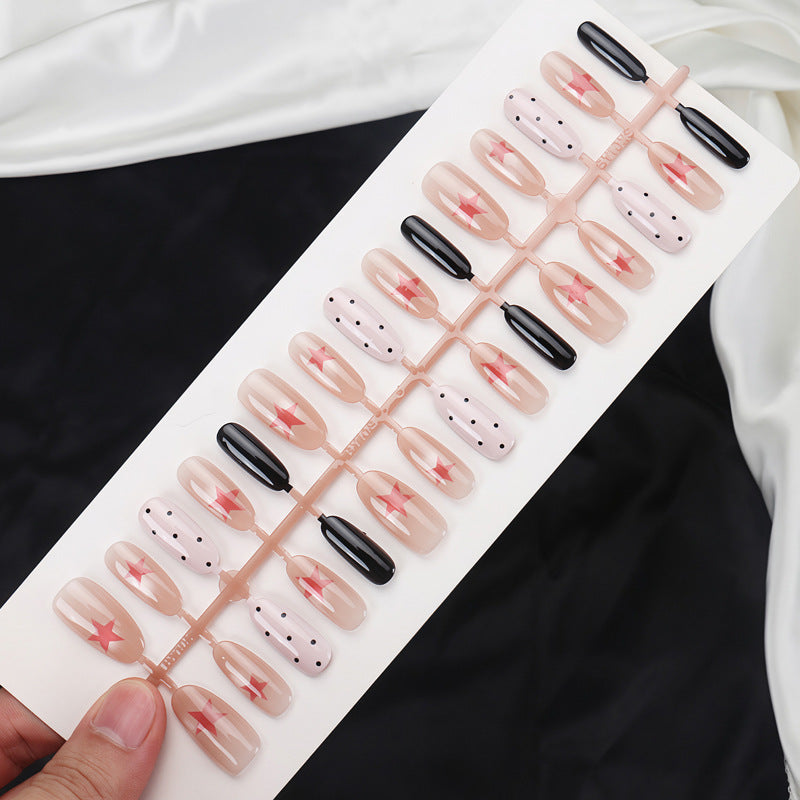 Künstlerisches Press-On-Nagel-Set mit mutigen Stern Designs Karnz