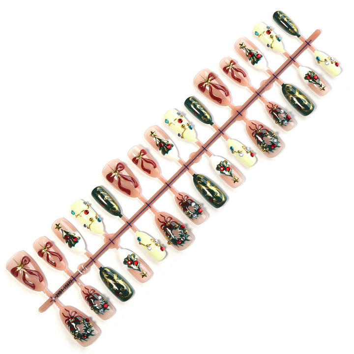 Festliche Kunstnägel mit Weihnachtsmotiven Karnz