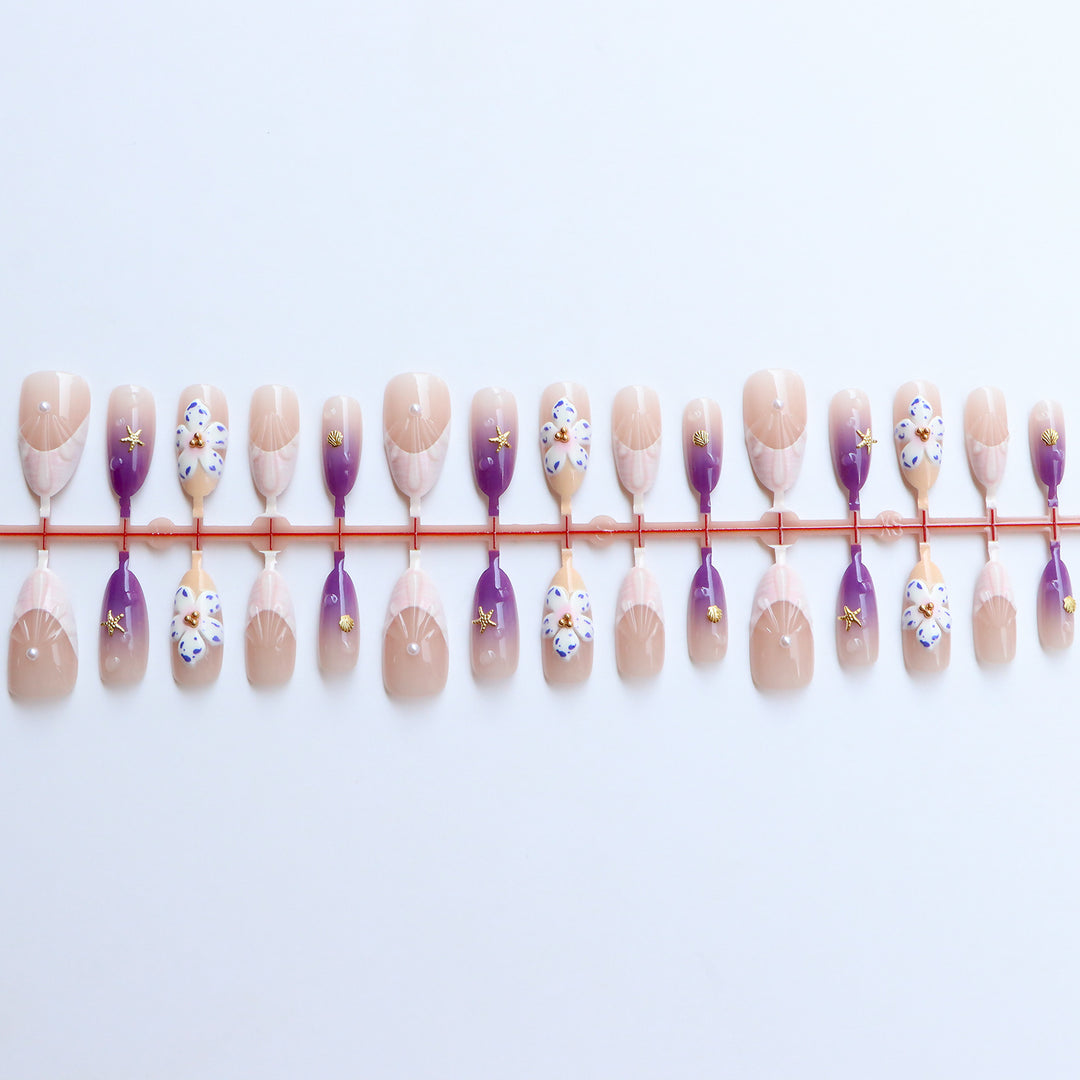 Dekoratives Press-On Nagelkunst Set mit floralen und ozeanischen Themen Karnz