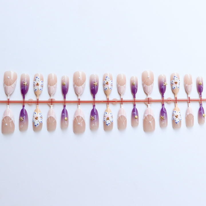 Dekoratives Press-On Nagelkunst Set mit floralen und ozeanischen Themen Karnz