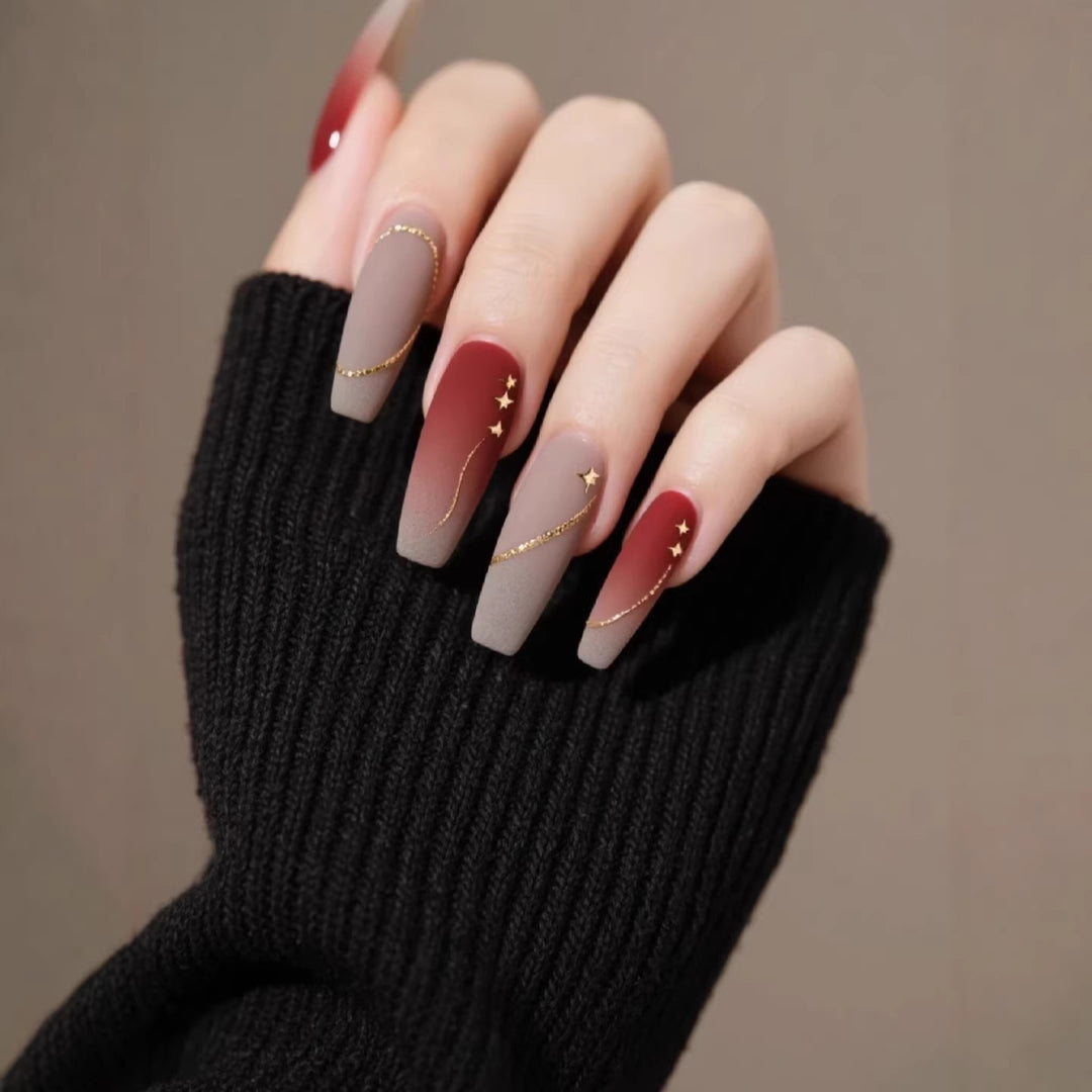 Künstlerisches Gradient Press-On Nagelset mit Sternakzenten