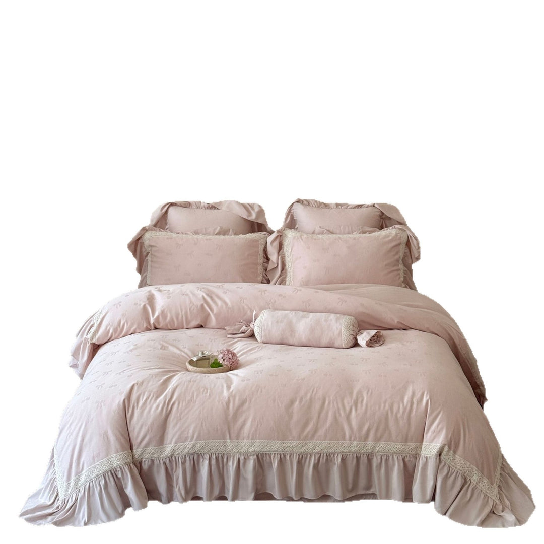 Gepatchtes Baumwollmischung-Duvetbezug-Set mit Rüschenschürze und dekorativem Bolster
