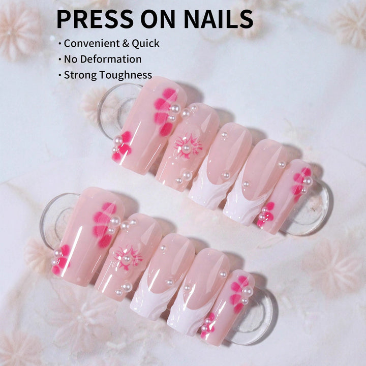 Kunstnagelset mit floralen 3D-Verzierungen und Perl-Akzenten Karnz