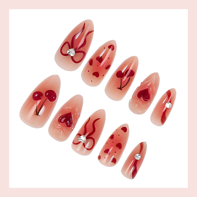 Kunstnagelset mit romantischen Herz- und Kirschmotiven Karnz